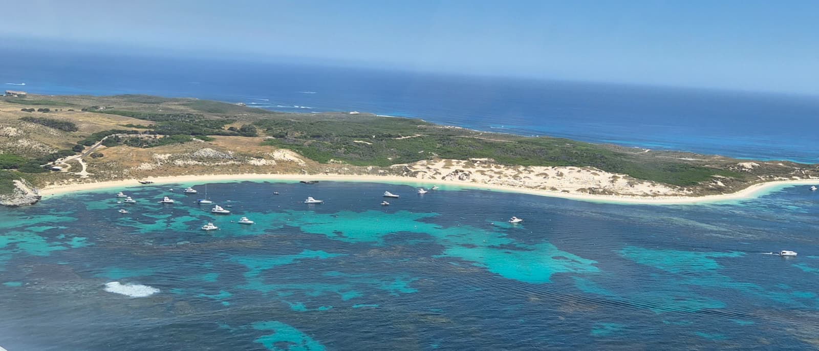 Aerial view of Rottnest Island bay with boats